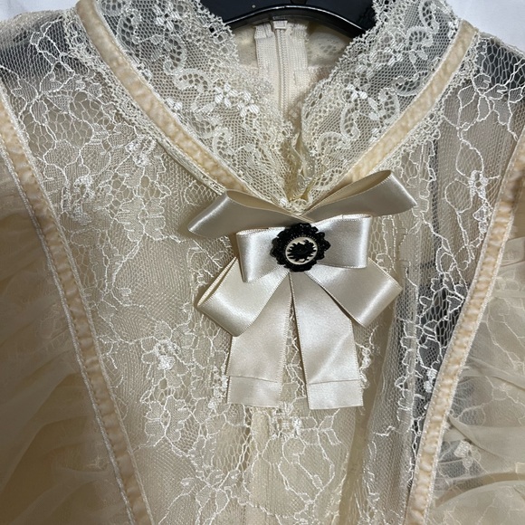 Dolls Kill Cream Sheer Lace Ruffle Blouse with Satin Bow - Picture 2 of 4